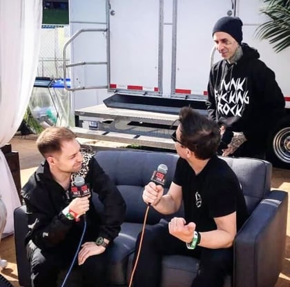 Dallas Osborn interviewing Travis Barker and Mark Hoppus of Blink-182