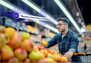 A young person grocery shopping that here's an in-store audio message that says 