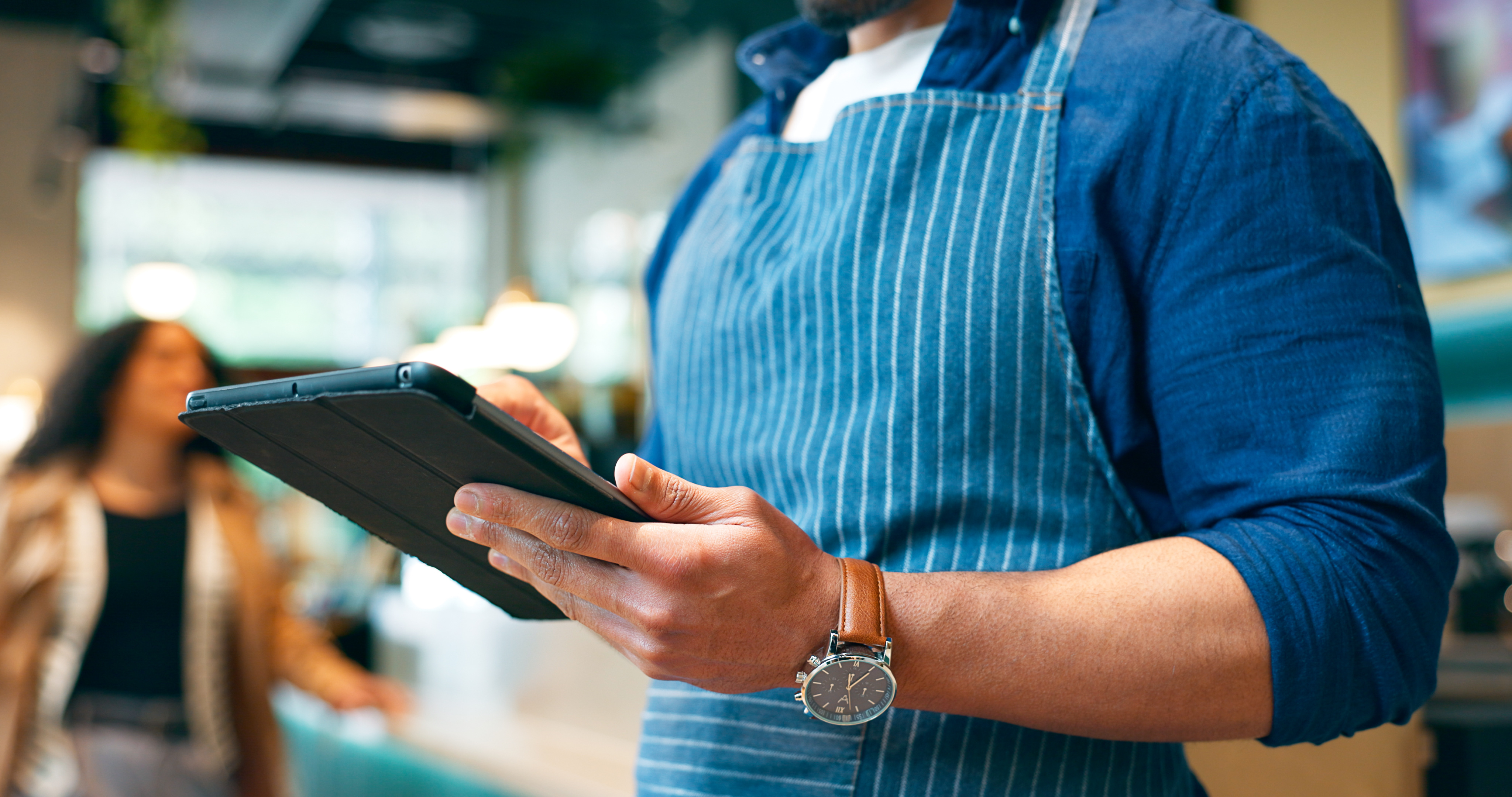 Business owner, hands and tablet for cafe or restaurant marketing